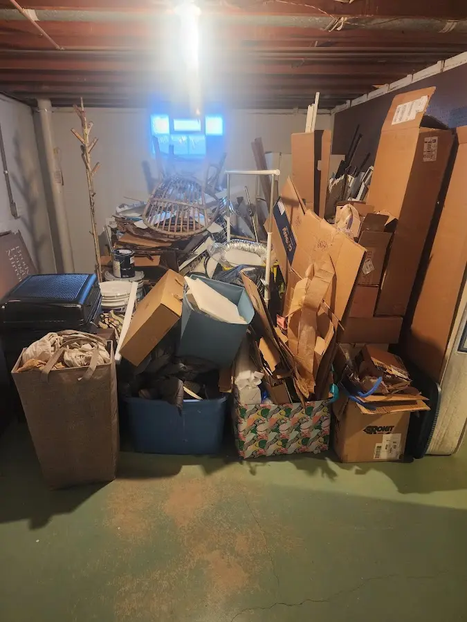 Roll-off dumpster container at job site for 2 Yard Dumpster Rental in Lansford